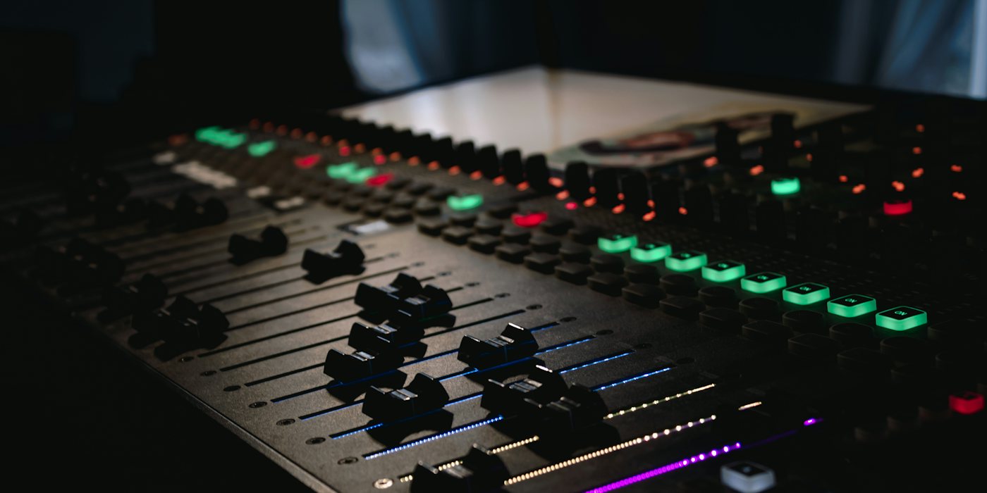 black and green audio mixer
