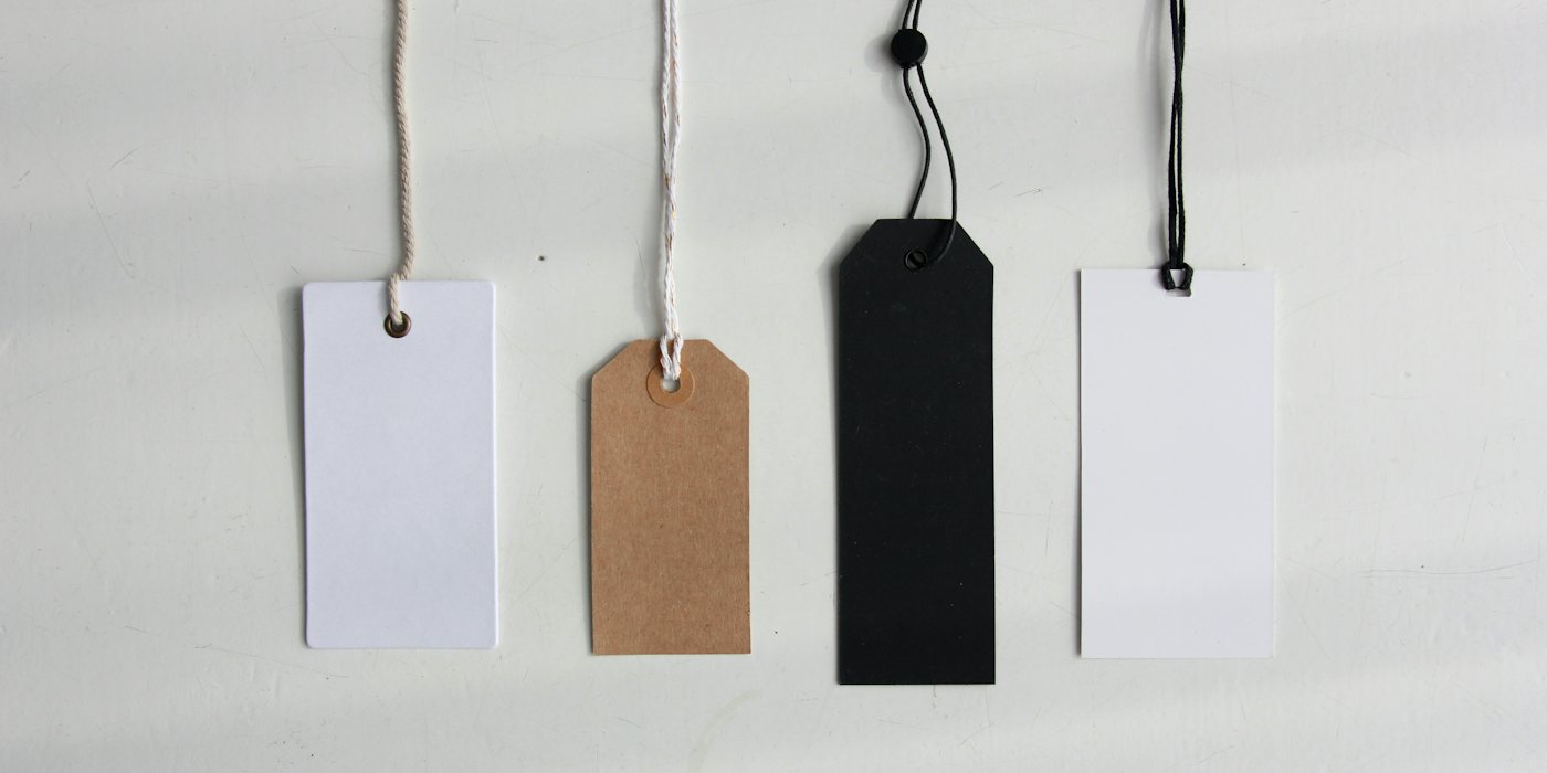 four paper card tags