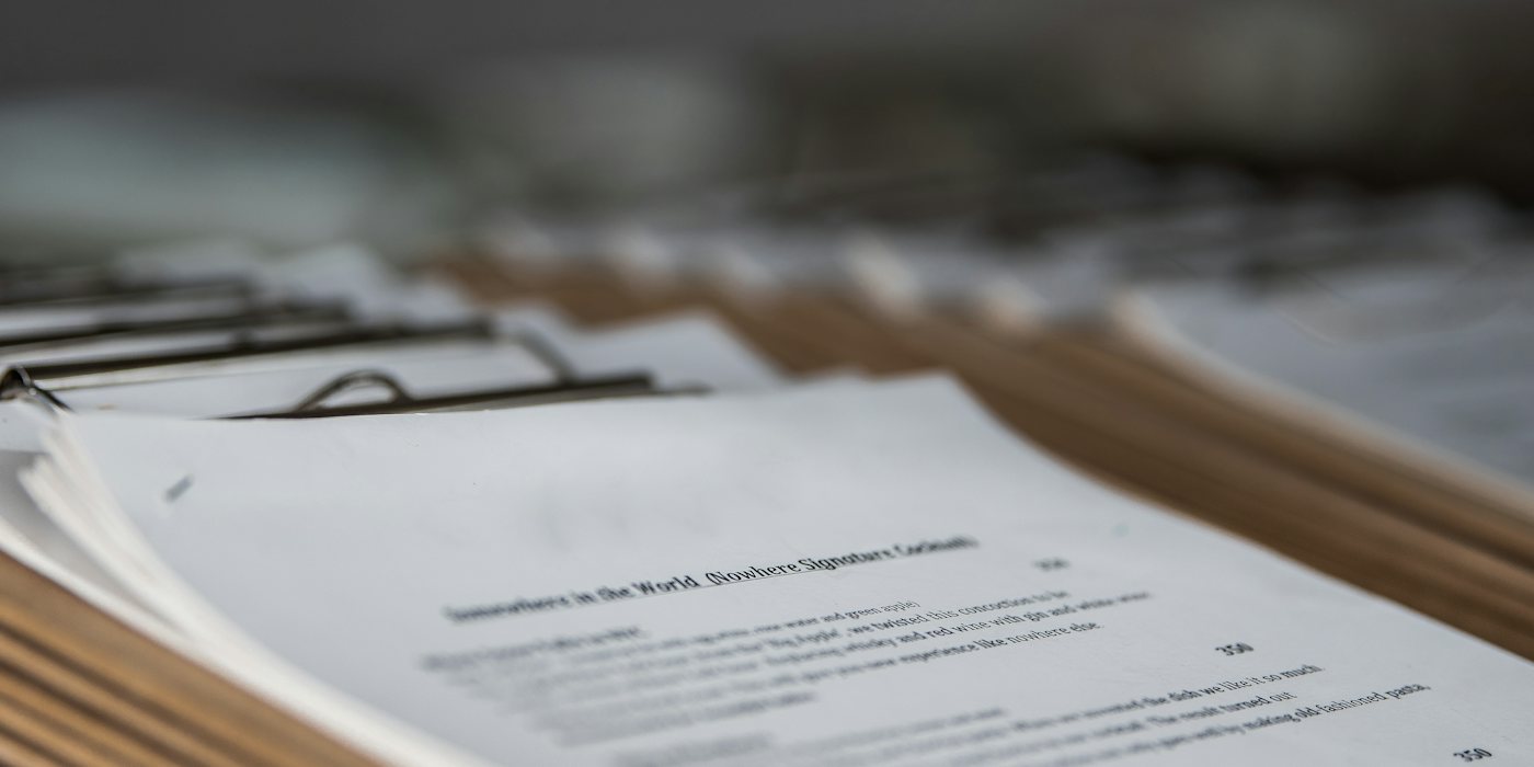 restaurant menus on clipboards close up