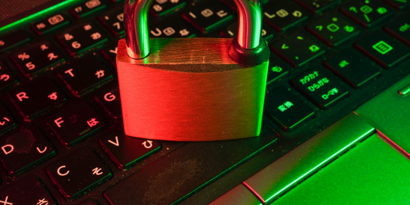 red padlock on black computer keyboard